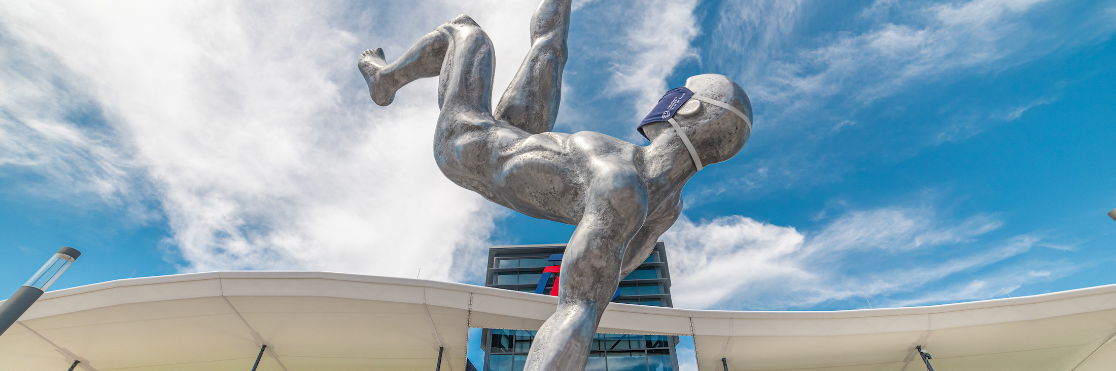 National Soccer Hall of Fame Statue with a mask on