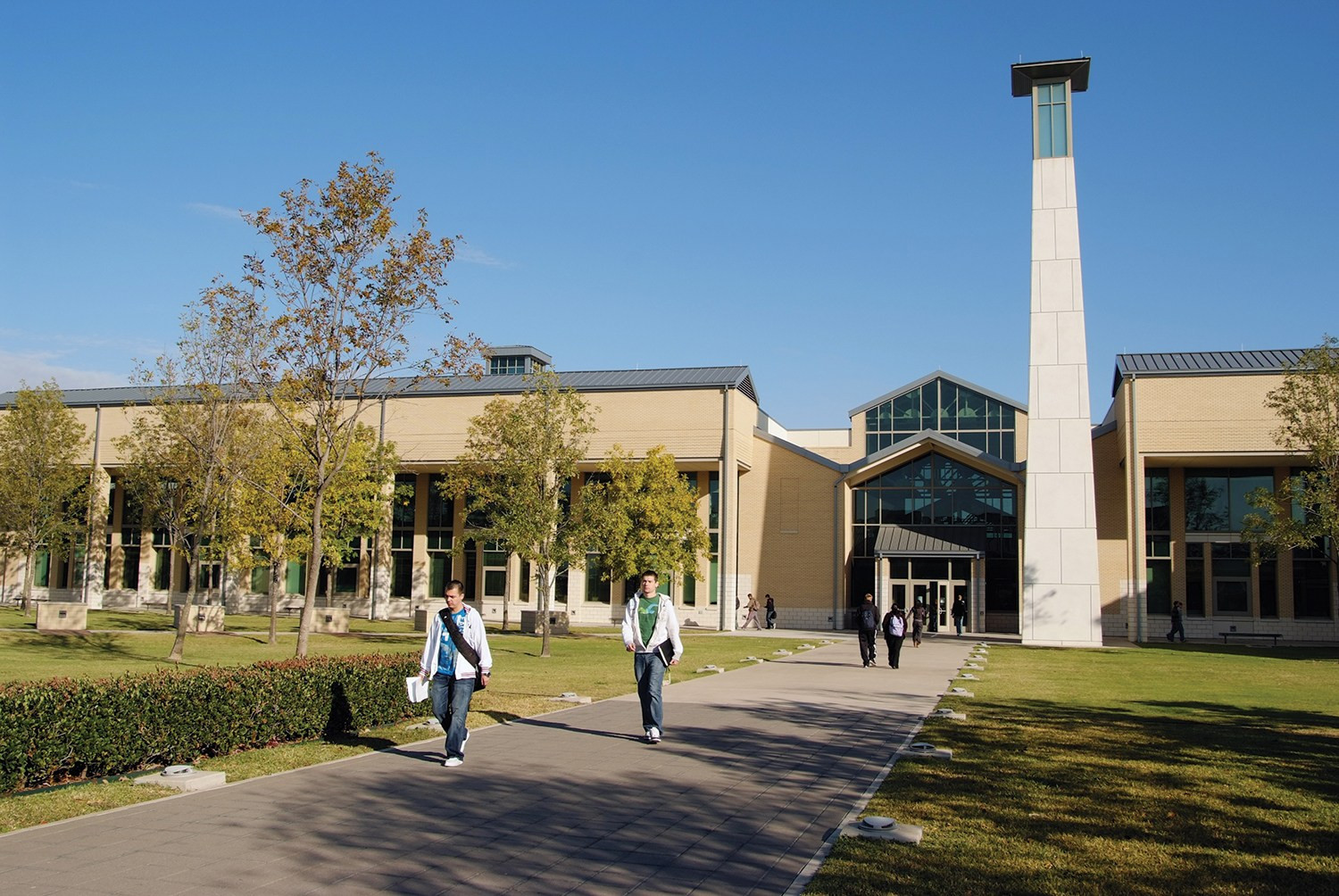 Students walk on the Collin College campus.