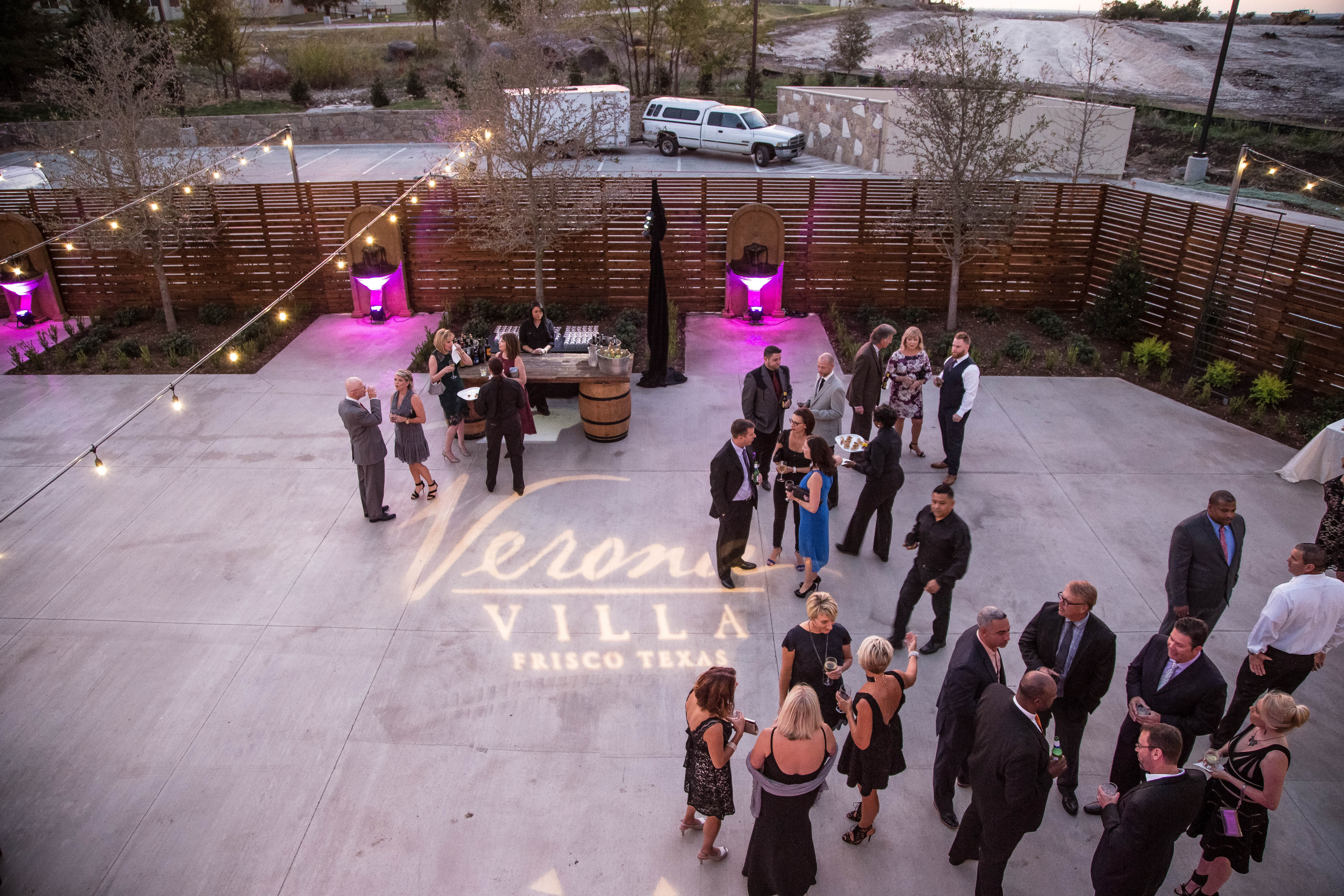 Overhead shot of people gathered on the patio of Verona Villa, an event venue in Frisco.